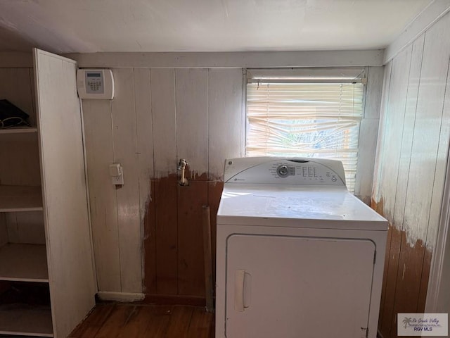 54 Shary Ave, Brownsville, TX 78521 - laundry area featuring washer / clothes dryer, wood walls, and wood finished floors