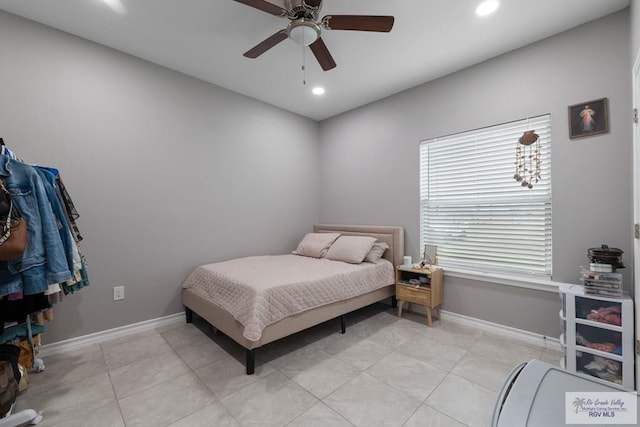 bedroom featuring light tile patterned flooring, recessed lighting, a ceiling fan, and baseboards