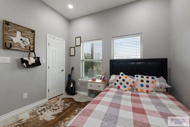 bedroom with baseboards and recessed lighting