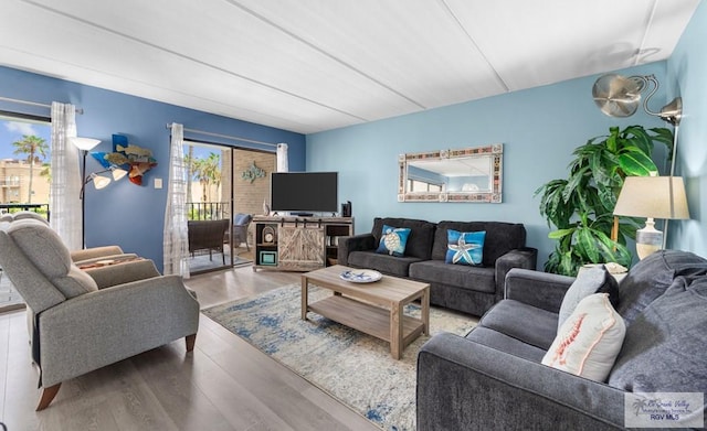111 E Morningside Dr Unit 209, South Padre Island, TX 78597 - living room with wood finished floors