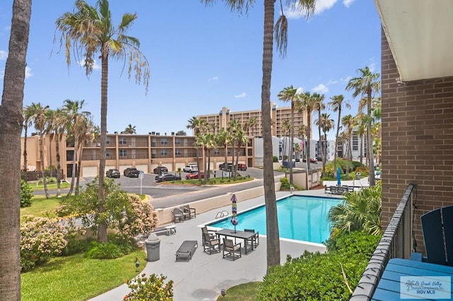 111 E Morningside Dr Unit 209, South Padre Island, TX 78597 - community pool featuring a patio