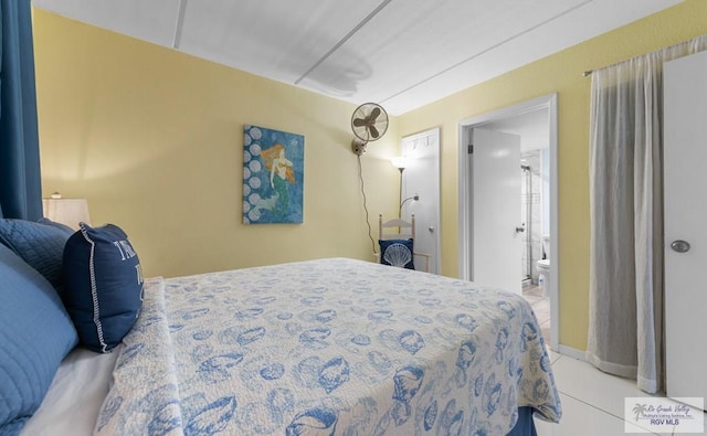 111 E Morningside Dr Unit 209, South Padre Island, TX 78597 - tiled bedroom with connected bathroom