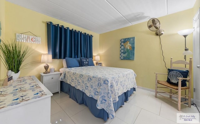 111 E Morningside Dr Unit 209, South Padre Island, TX 78597 - bedroom with light tile patterned flooring