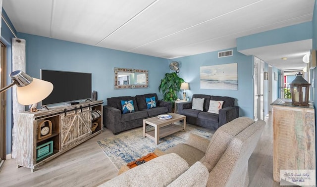 111 E Morningside Dr Unit 209, South Padre Island, TX 78597 - living area with wood finished floors