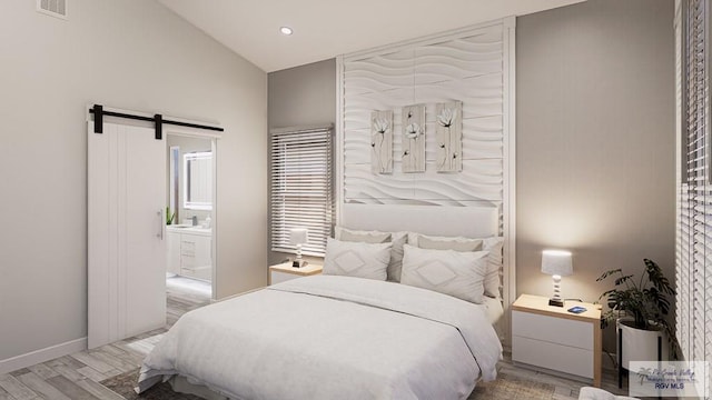 234 Cameo Dr, San Benito, TX 78586 - bedroom featuring light wood-style flooring, a barn door, baseboards, connected bathroom, and recessed lighting