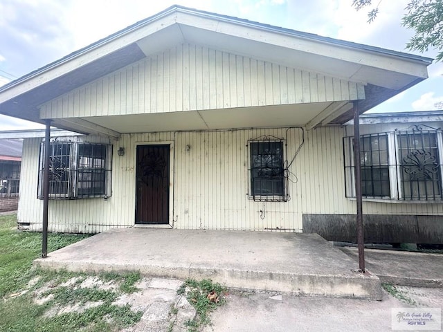 22920 Angel St, Harlingen, TX 78552 - view of front of house with a carport