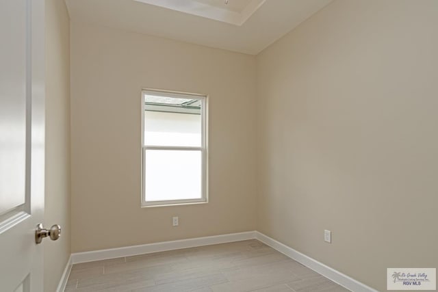 spare room featuring light hardwood / wood-style floors