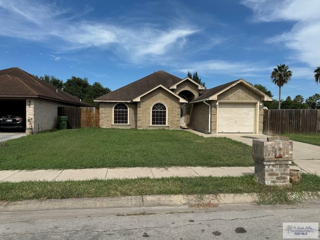 single story home with a garage and a front yard