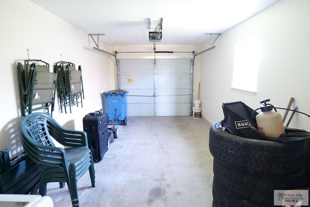 9165 Los Olmos Dr, Los Fresnos, TX 78566 - garage with a garage door opener