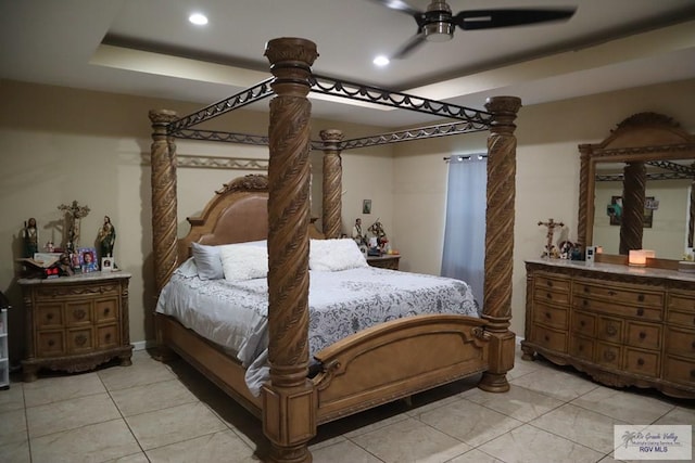 bedroom with ceiling fan and light tile patterned floors