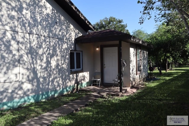 view of property exterior featuring a yard