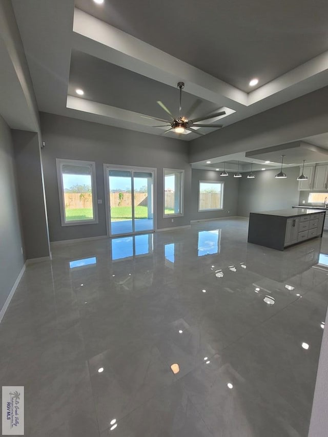 spare room featuring marble finish floor, baseboards, a ceiling fan, and recessed lighting