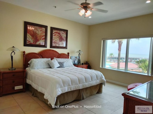 bedroom featuring recessed lighting, baseboards, ceiling fan, and light tile patterned floors