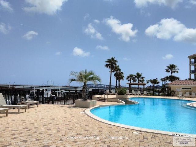 pool featuring a patio