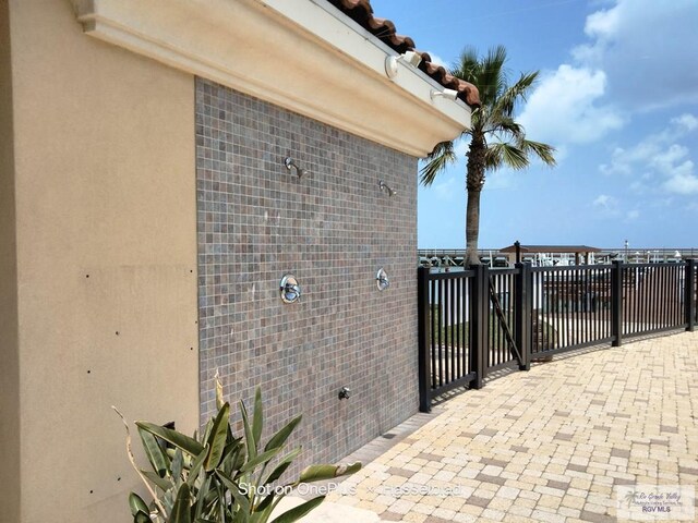 301 E Houston St Unit 1201, Port Isabel, TX 75052 - exterior details featuring stucco siding and brick siding