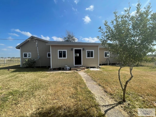 view of front of home with a front yard