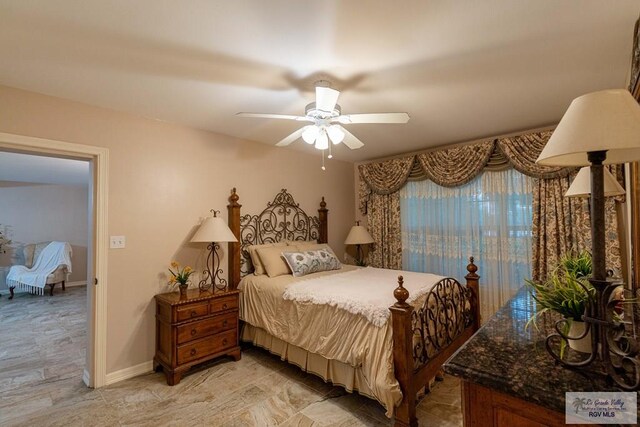 bedroom featuring ceiling fan and light wood-type flooring