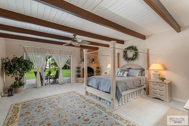 bedroom with access to outside, ceiling fan, light colored carpet, and beam ceiling