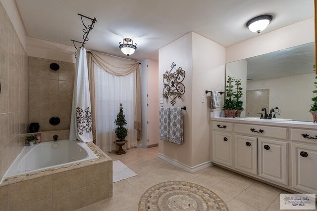 bathroom with tile patterned flooring, vanity, and shower / tub combo