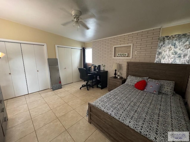 1901 Martha St, Harlingen, TX 78550 - bedroom with two closets, light tile patterned floors, a ceiling fan, and an office area