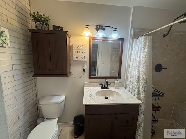 1901 Martha St, Harlingen, TX 78550 - full bathroom featuring vanity, a shower with shower curtain, and tile patterned flooring