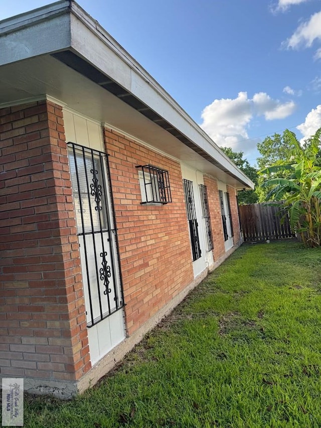 1901 Martha St, Harlingen, TX 78550 - view of property exterior featuring brick siding