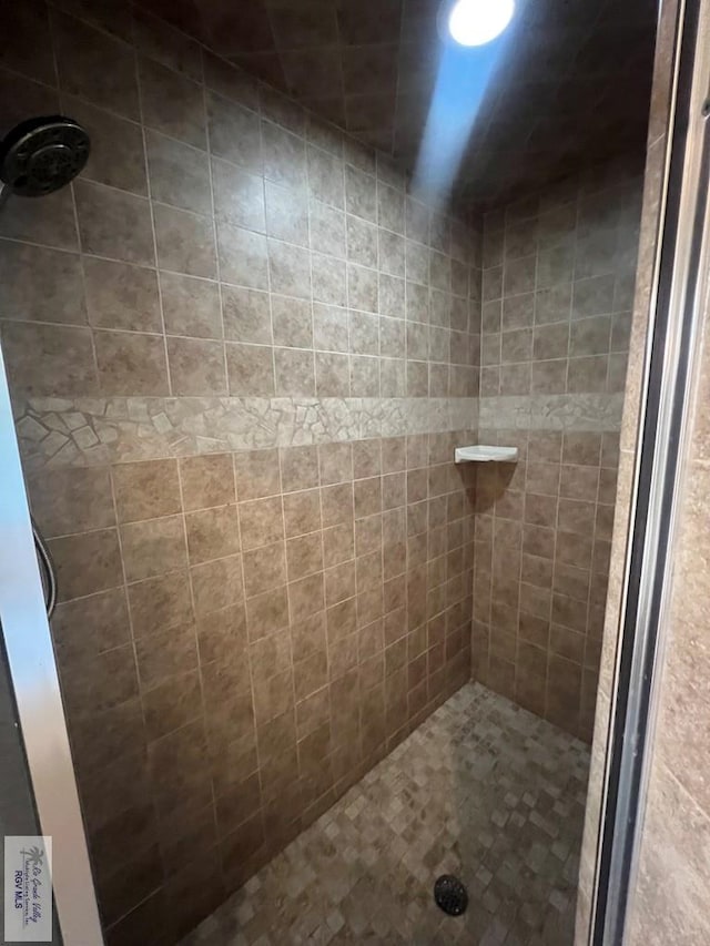 1714 Christian Cir, Harlingen, TX 78550 - bathroom featuring a tile shower
