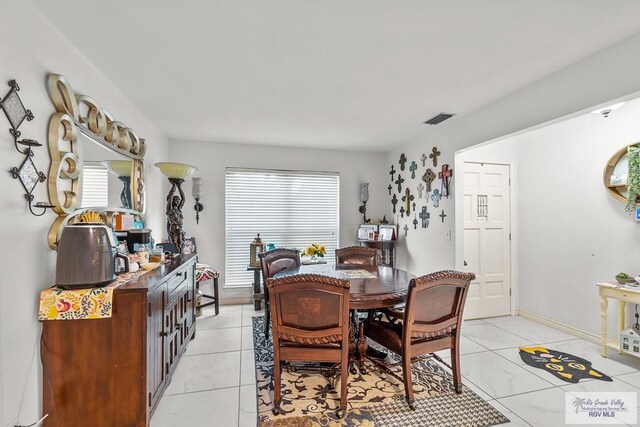 dining space with a healthy amount of sunlight