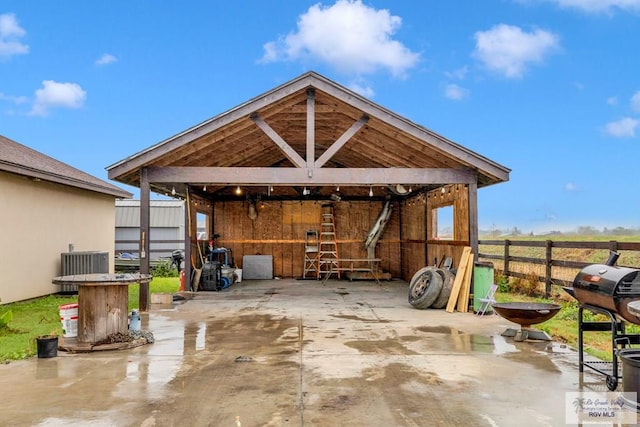 view of patio featuring area for grilling and central AC