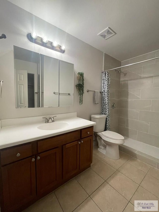 bathroom with walk in shower, tile patterned flooring, vanity, and toilet