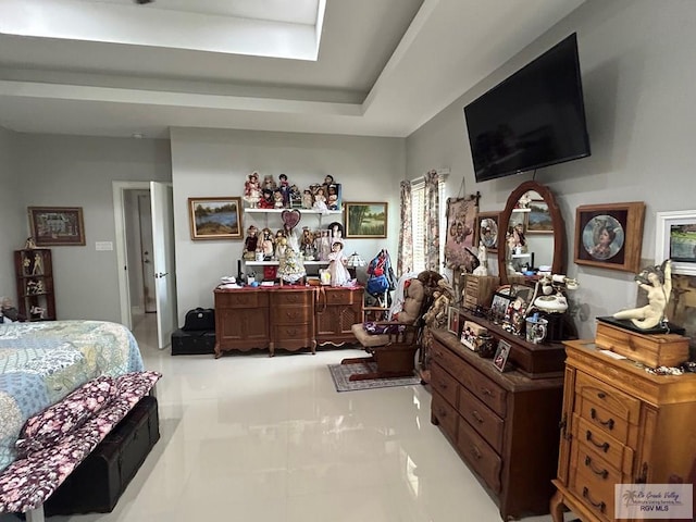 bedroom featuring a tray ceiling