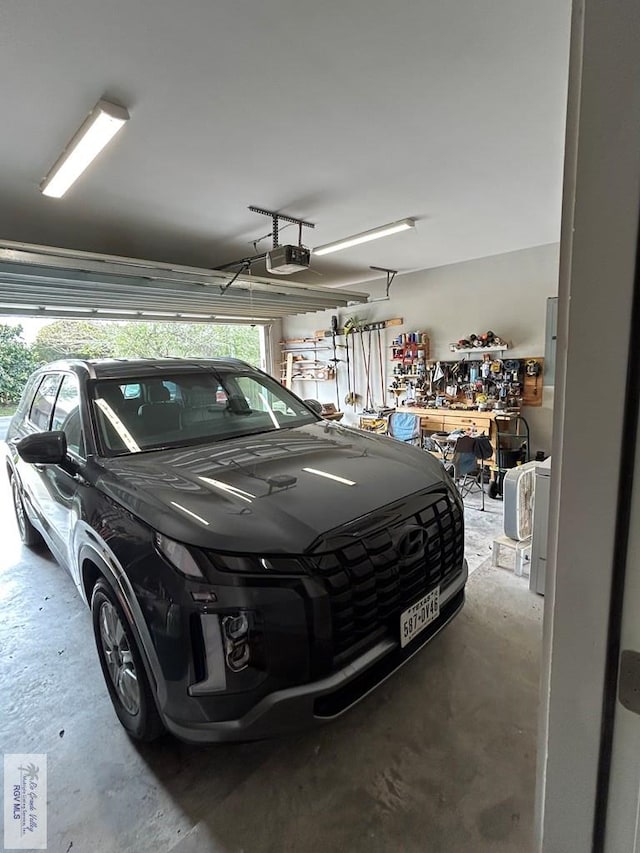 garage featuring a garage door opener