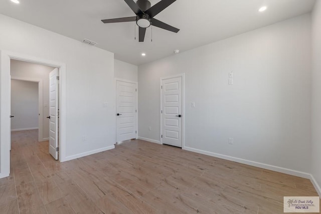 unfurnished bedroom with light hardwood / wood-style floors and ceiling fan