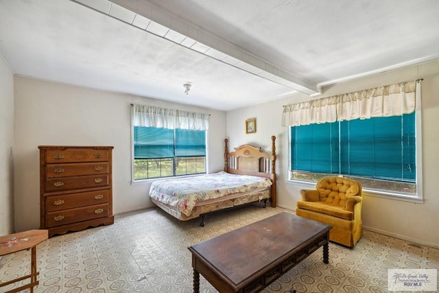 734 Billy Mitchell Blvd, Brownsville, TX 78521 - bedroom with beamed ceiling and baseboards