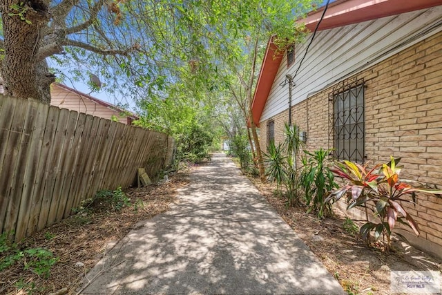 734 Billy Mitchell Blvd, Brownsville, TX 78521 - view of side of home featuring brick siding
