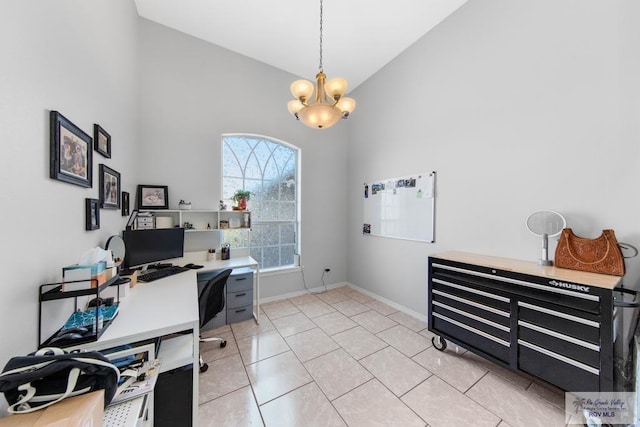 office featuring a chandelier, high vaulted ceiling, and light tile patterned flooring