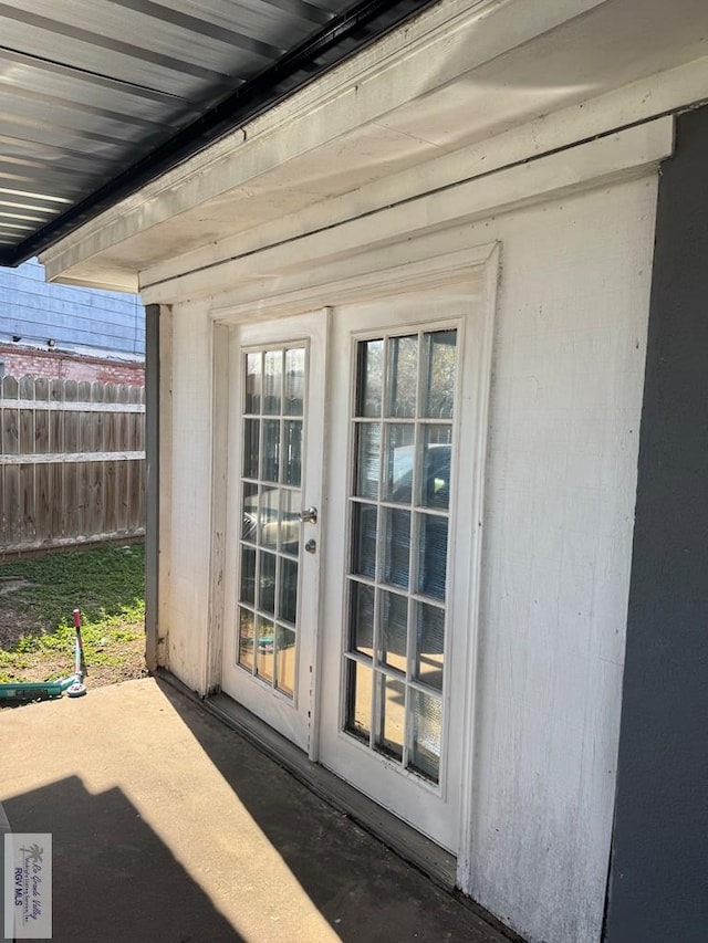 property entrance with a patio