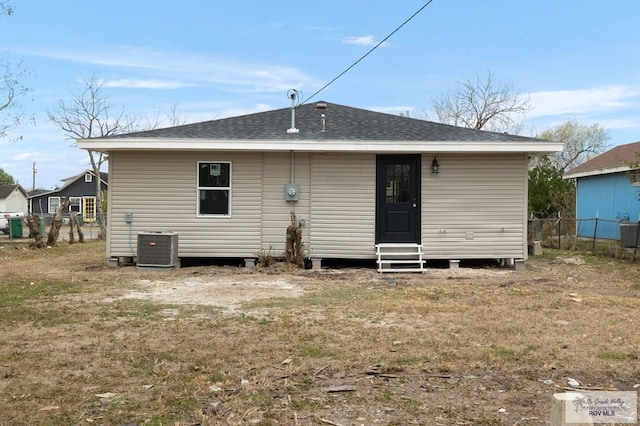 back of property featuring cooling unit