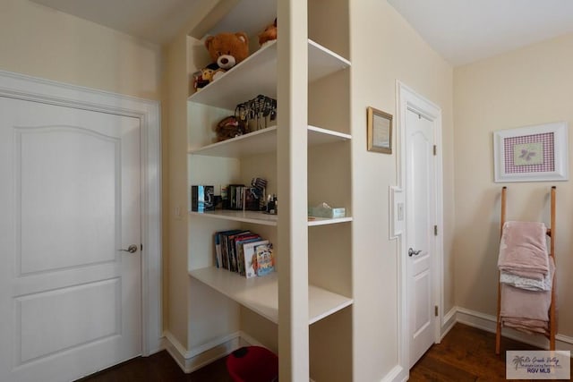 31660 Fm 1575, Los Fresnos, TX 78566 - hallway featuring dark wood-style floors and baseboards