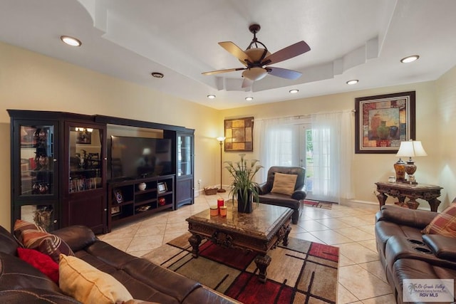 31660 Fm 1575, Los Fresnos, TX 78566 - living room with a raised ceiling, light tile patterned flooring, a ceiling fan, baseboards, and recessed lighting