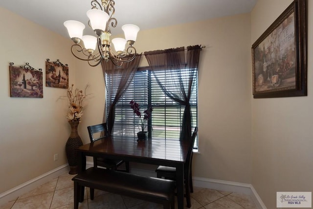 31660 Fm 1575, Los Fresnos, TX 78566 - dining space featuring a chandelier, light tile patterned floors, and baseboards