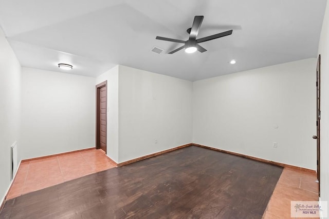 2307 Carlos Ave, Brownsville, TX 78526 - unfurnished room with ceiling fan, wood finished floors, visible vents, and baseboards