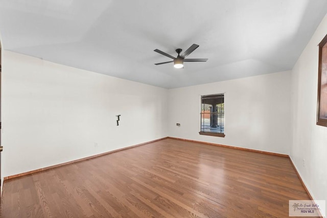 2307 Carlos Ave, Brownsville, TX 78526 - empty room with ceiling fan, baseboards, and wood finished floors