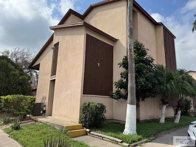 exterior space with central air condition unit