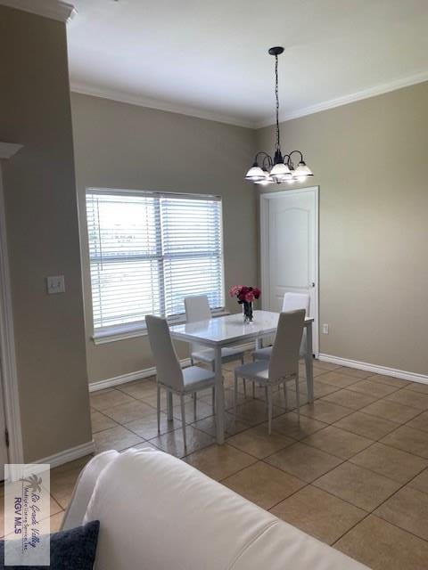 tiled dining room with crown molding and a notable chandelier