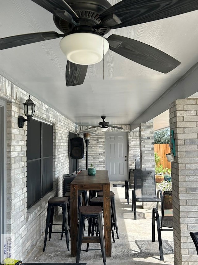 view of patio with ceiling fan