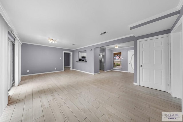 unfurnished living room featuring crown molding and light wood-type flooring