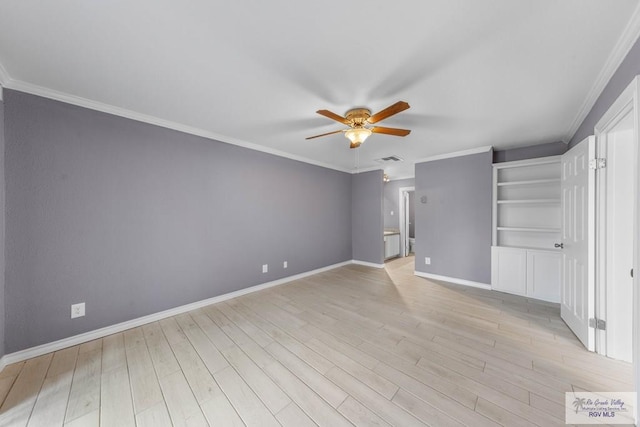 interior space featuring ceiling fan, light wood-type flooring, and ornamental molding