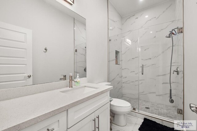 122 Heron Dr, Los Fresnos, TX 78566 - full bath with marble finish flooring, a marble finish shower, and vanity