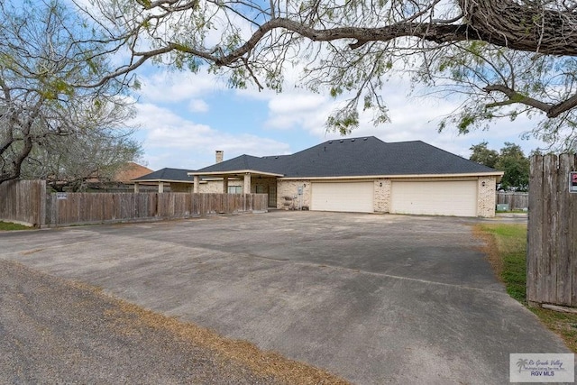 view of front of house with a garage